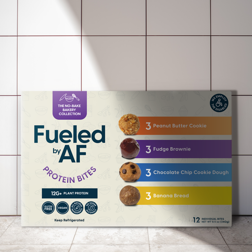 Lifestyle photo of Fueled by AF Baking Bites 12 count box on kitchen counter with tile behind it
